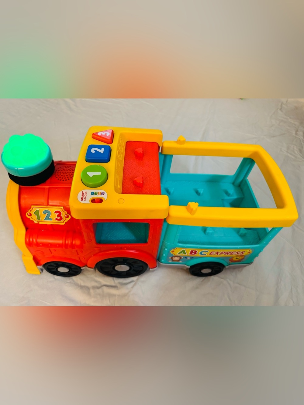 Little People ABC Express Educational Ride-On Toy Train - Red, Yellow, Teal